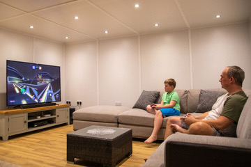 Family lounge with sofa and TV