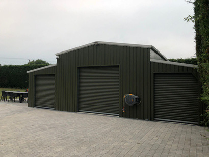 Green barn-style build